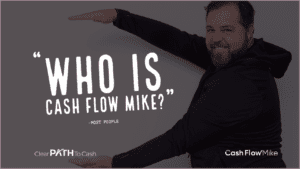 A man holding a who is cash flow mike font