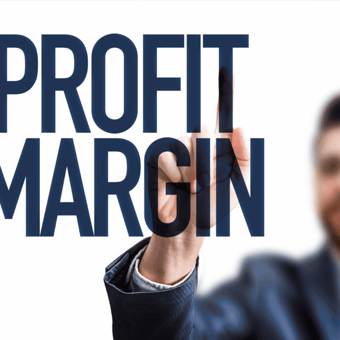 Businessman pointing at Profit Margin text on transparent screen